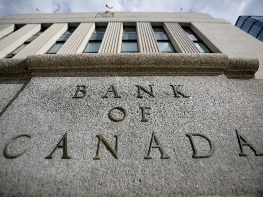 Bank of Canada taglia i tassi di interesse, avverte il conflitto commerciale "danneggerà"