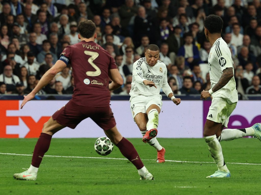 Il Real Madrid ha battuto il Manchester City per 3-1 per raggiungere la Champions League ultimo 16