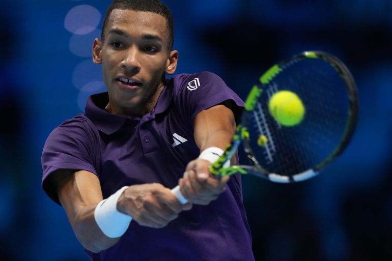 Felix Auger-Aliassime in azione.