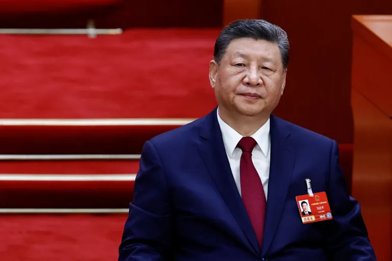Xi