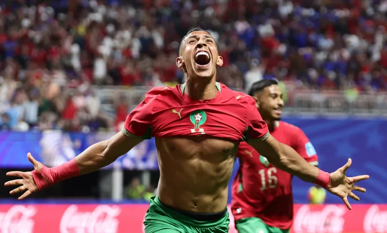 epaselect epa13062318 Soufiane Rahimi del Marocco festeggia dopo aver segnato il vantaggio per 3-2 durante la partita della fase a gironi della Coppa del mondo FIFA 2026 tra Marocco e Haiti, ad Atlanta, Georgia, USA, 24 giugno 2026. EPA/RONALD WITTEK